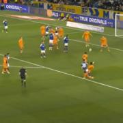 Omari Hutchinson curls the ball into the top corner for Ipswich Town's second goal in their 3-3 draw at Hull City