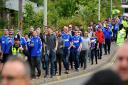 Ipswich Town fans make their way to Carrow Road football stadium in Norwich. Picture: ASHLEY PICKERING