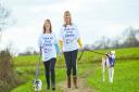 Julie Raz with Buster and her sister Cathy Pawsey-Ling and her dog Peter Picture: CRUK/MARK HEWLETT PHOTOGRAPHY