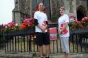 David and Alison Float are attempting to set up the first branch of Save the Children in Suffolk. David and Alison are pictured outside St Peter's Church in Sudbury.