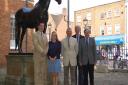 Chris Garibaldi, director of the National Horseracing Museum with Amy Starkey, regional director for Jockey Club racecourses, with councillors David Bowman, Warwick Hirst and Stephen Edwards, by the statue of Hyperion
