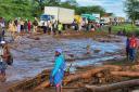 Police in Kenya say at least 40 people have died after a dam collapsed in the country’s west (AP Photo)