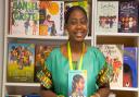 Founder Funmi Akinriboya at the BME's diverse library
