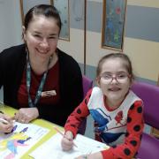 Sadie pictured here with her teacher Angela Cornwell-Revens at the West Suffolk Hospital school.