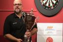 Jason Stalker with Howdens Grand Prix singles trophy at the Sudbury & District Invitational Darts League finals. Picture: CONTRIBUTED