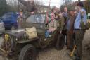 Supporter of the Colne Engaine War Memorial project in the Jeep they intend to use for the jail break in April