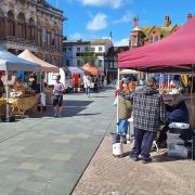 The Artisan and Producers' Market on Ipswich Cornhill went ahead despite the wind.