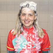 Danielle invited colleagues and friends to throw pies at her for an extra donation