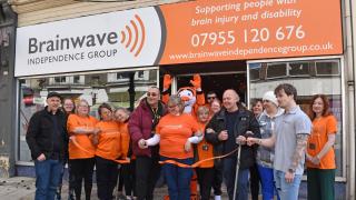 Service users cut the ribbon to mark the official opening of the new Brainwave Independence Group - Brain injury and disability support charity shop on London Road North, Lowestoft. Picture: Mick Howes