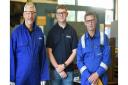 Jack Milton, (pictured centre with managers at Sizewell C) is a projects control apprentice at the nuclear power station