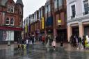 Sales shoppers braving the rain in Ipswich town centre on Monday