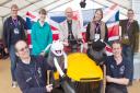 The Church of England has provided fun activities on its stand at the Suffolk Show. Back L-R: Julie Daniels, Grace Kent, Bishop Martin Seeley, Sarah Duboulay, Lorna Todd. Front L-R: James Gibson and Ben Alty with their puppets.