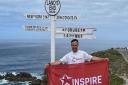 Ali Clements completes his challenge at Land's End in memory of Joe Langfield