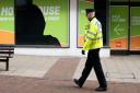 A police officer walks through Ipswich during the first coronavirus lockdown. Picture: SARAH LUCY BROWN