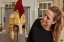 The Staffordshire hoard helmet reconstruction, with conservator Lizzie Miller  Picture: Birmingham Museums Trust