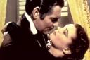 What a kiss... Rhett Butler (Clark Gable) and Scarlett O'Hara (Vivien Leigh) in Gone With The Wind. Picture: MGM