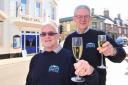 Beccles Public Hall directors John Cushing and Terry Dentith celebrate two years running as a community owned venue.
