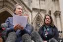 Cathy Gardner (left) and Fay Harris, whose fathers died from Covid-19, speaking outside the Royal Courts of Justice.