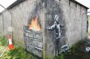 Banksy's Season's Greetings appeared on the outside of a steelworker's private garage in Taibach, Port Talbot on December 19 2018