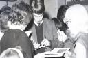 Charlie Watts signing autographs when the Rolling Stones played the Ipswich Gaumont on October 9, 1964