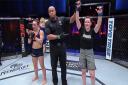 Cory McKenna has her hand raised after beating Vanessa Demopoulos on Dana White's Contender Series in Las Vegas, earning a UFC contract