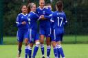 Town Women players celebrate one of Paige Peake's goals in the Blues 4-0 win over Cambridge City Picture: ROSS HALLS