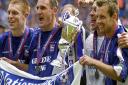 pswich Town goalscorers Richard Naylor, Tony Mowbray, Martijn Reuser and Marcus Stewart with the trophy, after they defeated Barnsley 4-2 in their Division 1 play-off final at Wembley Stadium, London, in 2000      Picture: Rebecca Naden/PA Images