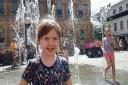 Aurora enjoying the fountains on the Cornhill last summer - but when will they be switched on this year? PICTURE: RACHEL EDGE