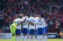 The Ipswich team huddle up before kick-off at Nottingham Forest