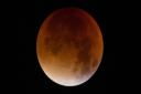 A blood-red lunar eclipse in London. Sunday September 28, 2015. Credit: Yui Mok/PA Wire.