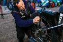 Witches Director of Speedway Chris Louis makes adjustments to Gino Manzares' rear wheel last week