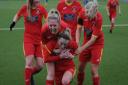 Needham Market Women celebrate one of their four goals in their win at Newmarket Town Photo: BEN POOLEY