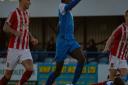 Suji Odelusi powers through on goal as Will Davies  is brought down in the box, although Leiston's penalty claims are waved away by the referee. Picture: HANNAH PARNELL