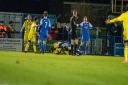 Leiston appeal for a free kick with the referee Photo: HANNAH PARNELL