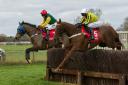 Gina Andrews, left, on her way to win number 200 aboard Sharp Suit at Cottenham. Picture: GRAHAM BISHOP PHOTOGRAPHY