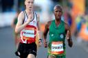 Suffolk's Callum Wilkinson, left, competing alongside South Africa's Lebogang Shange in the men's 20km race walk at Currumbin Beachfront on day four of the 2018 Commonwealth Games. Picture: PA