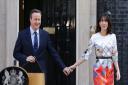 Prime Minister David Cameron walks out of  10 Downing Street, London, with wife Samantha. Photo: Daniel Leal-Olivas/PA Wire