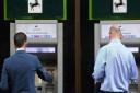 Lloyds Banking Group said it is cutting 3,000 jobs and shutting 200 branches as the lender braces for a cut in interest rates following Britain's decision to quit the European Union.