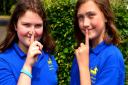 Lucie Jenkins (left) and Freya Howlett of Tattingstone Primary School who are taking part in a sponsored silence to raise money for a cancer support charity.