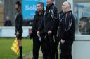 Leiston manager, Richard Wilkins (centre), watches on at Bury