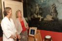 Framlingham opens it's doors around the town for the Heritage weekend.
Judith Lockie showed people the incredible ancient wall paintings in her house.
(L-R ) Judith Lockie with Denise Clayton ne Chambers whose grandmother used to live in the house.