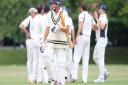 Phil Caley walking off as Knebworth celebrate another wicket. Picture: Karyn Haddon