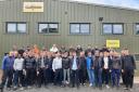 Jeff Claydon, centre front, with 70 Danish students visiting the company he founded, Claydon Drills in west Suffolk