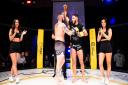 Tariq Pell has his hand raised after earning a second round submission win over Harry Davies at Cage Warriors Academy South East 30 in Colchester