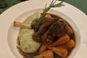 Lamb shank with minted mash and baby carrots
