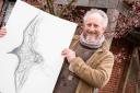 Artist Jason Gathorne-Hardy with his seagull drawings