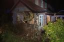 A man who was arrested after a van crashed into a home has been released