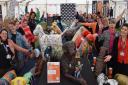 The 42 brightly coloured dog sculptures making up the PAWS-itvity campaign were finally unveiled at the Suffolk Show. Image: Suffolk Libraries