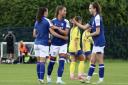 Ipswich Town Women players celebrate one of their six goals against Sudbury