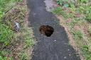 A large sinkhole has appeared on a footpath in Leiston
